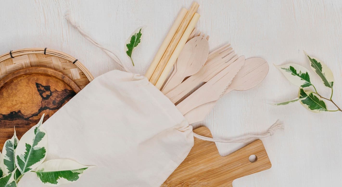 Compostable foodware breaking down into soil